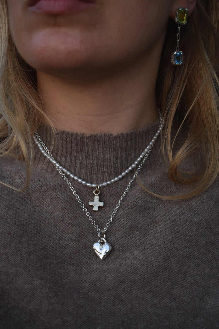 Classic love heart necklace in silver. Luxury big chunky heart-shaped silver chain. Signature heart a timeless classic that goes with any style ladies statement heart shaped jewellery tiffany heart necklace