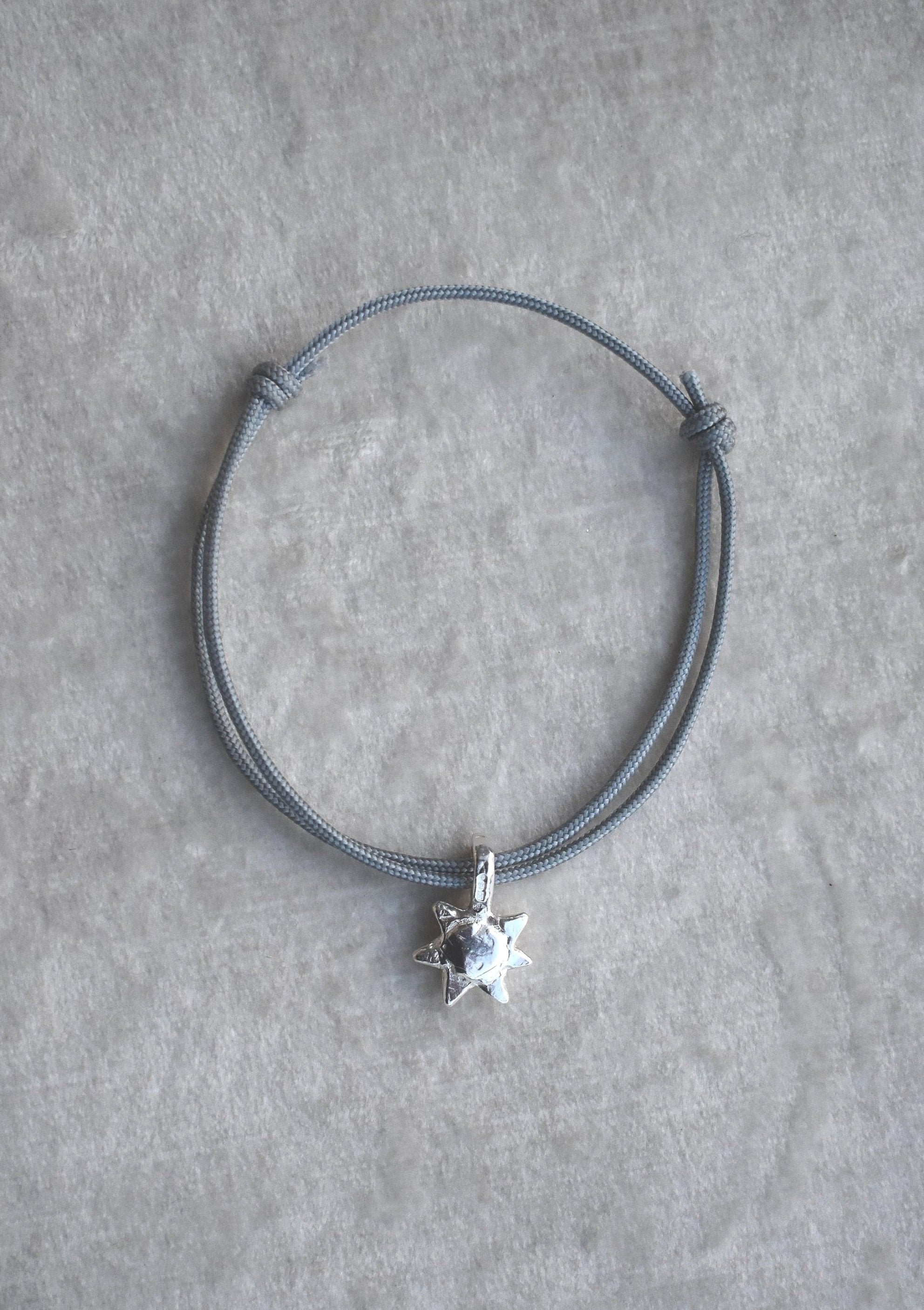 adjustable cotton rope bracelets with mini silver sun charm.All pieces are handmade to order. Please allow 7 days for dispatch.
silver charm bracelet. sailing rope silver charm bracelet gift for him small gift personalised bangle. silver sunshine charm happy bracelet colourful bracelet men's bracelet