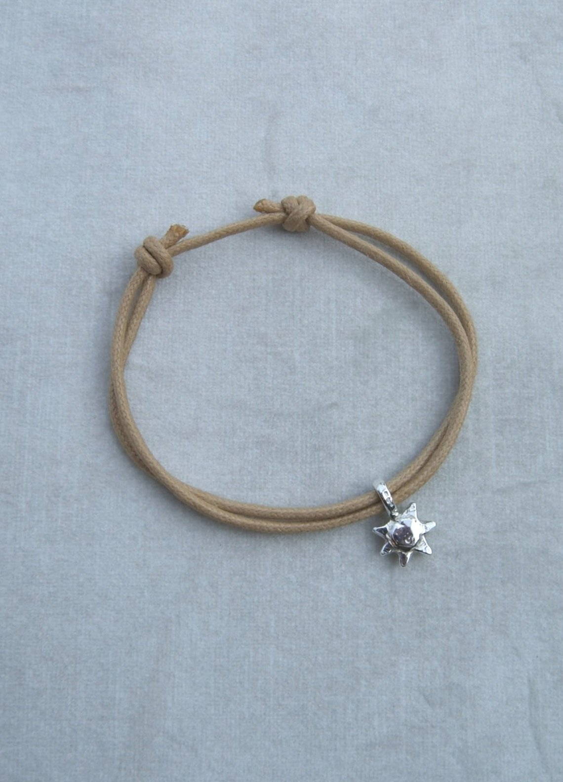 adjustable cotton rope bracelets with mini silver sun charm.All pieces are handmade to order. Please allow 7 days for dispatch.
silver charm bracelet. sailing rope silver charm bracelet gift for him small gift personalised bangle. silver sunshine charm happy bracelet colourful bracelet men's bracelet