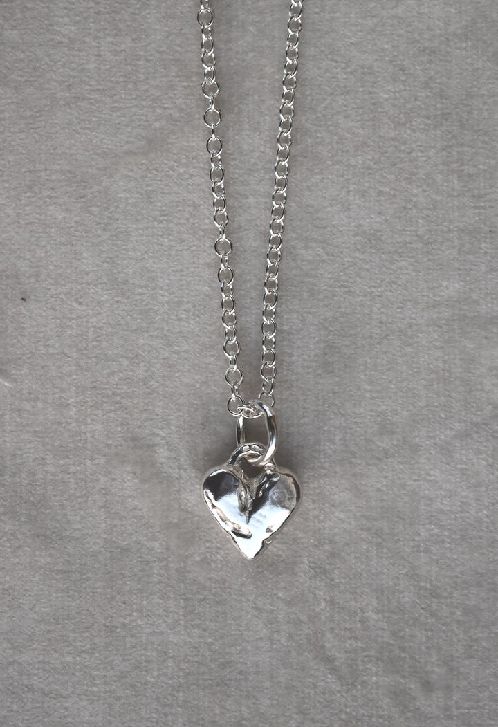 Classic love heart necklace in silver. Luxury big chunky heart-shaped silver chain. Signature heart a timeless classic that goes with any style ladies statement heart shaped jewellery tiffany heart necklace