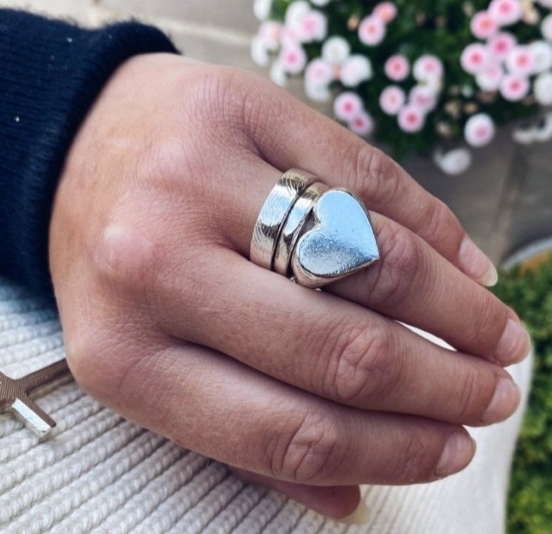 Classic love heart ring in silver. Luxury big chunky heart-shaped signet ring. Made from 100% recycled silver, hallmarked and stamped with individual maker’s mark. This heart ring is a perfect gift to the person that you love. Signature heart ring a timeless classic that goes with any style ladies statement heart signet ring