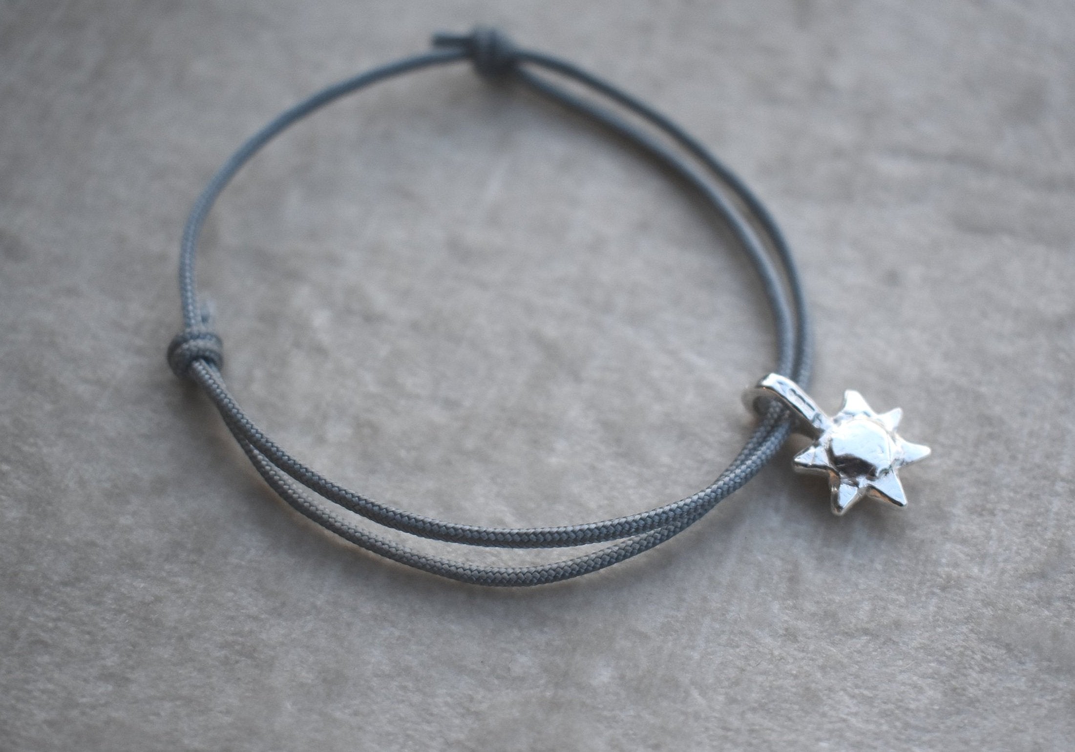 adjustable cotton rope bracelets with mini silver sun charm.All pieces are handmade to order. Please allow 7 days for dispatch.
silver charm bracelet. sailing rope silver charm bracelet gift for him small gift personalised bangle. silver sunshine charm happy bracelet colourful bracelet