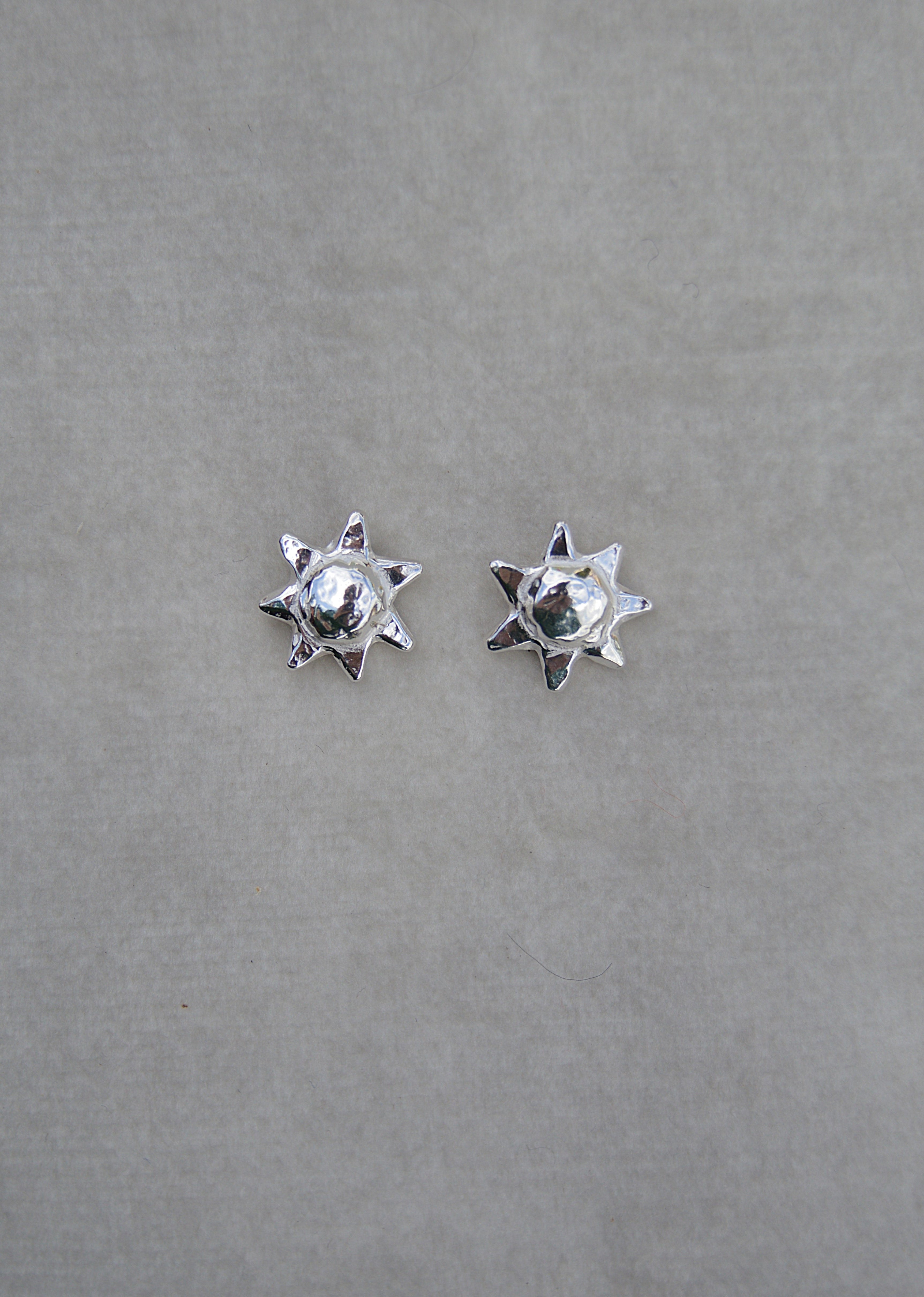 Silver sun shape studs. From the sunshine collection silver stud one size.
Sunshine shape stud charm silver earrings gift for her gift for him silver charm earrings