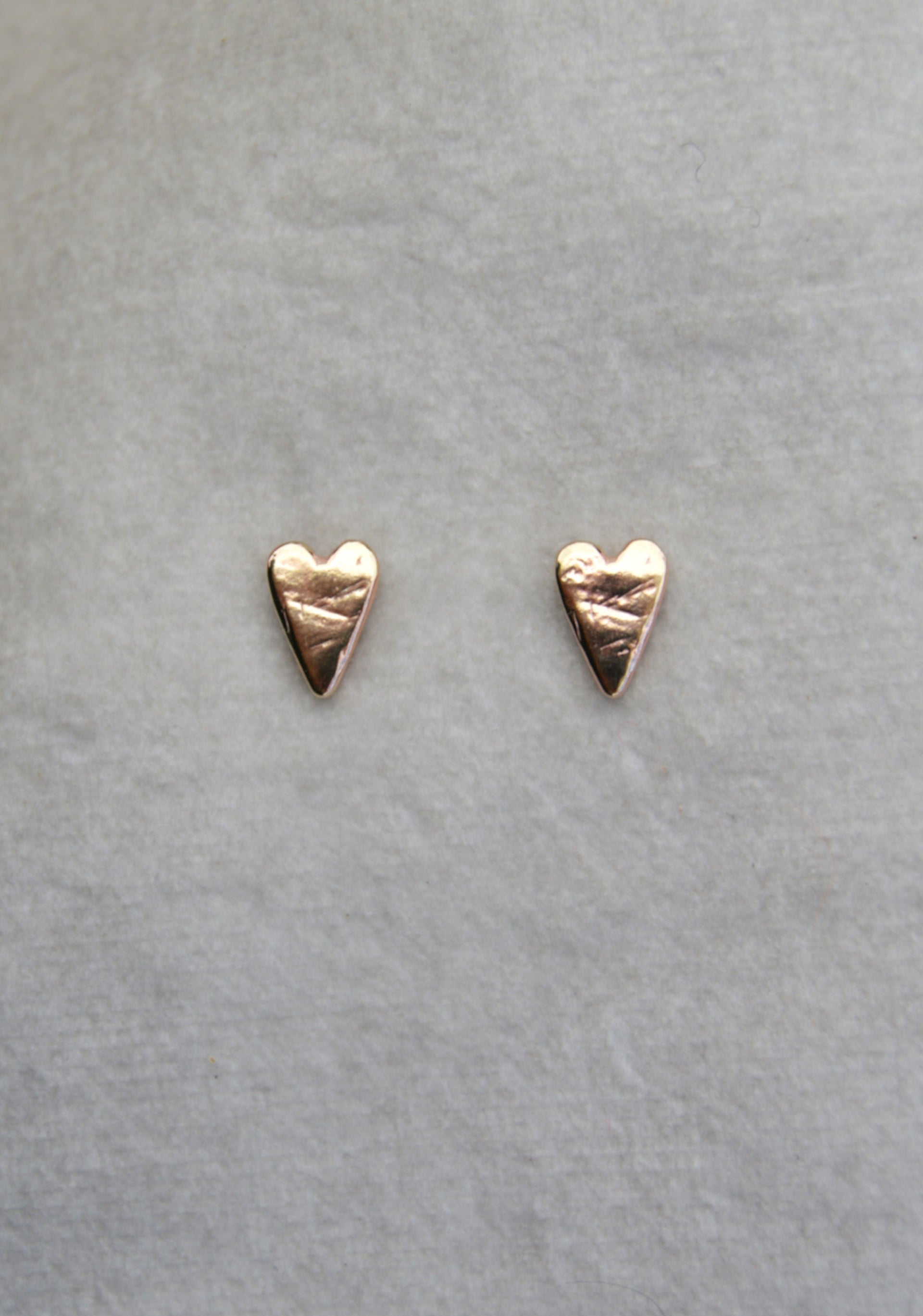 Solid 9ct gold heart shape studs.

gold heart shaped stud earrings mini charm earrings gifts for her valentines love earrings heart studs. Gold studs gold heart earrings tiffany heart earrings