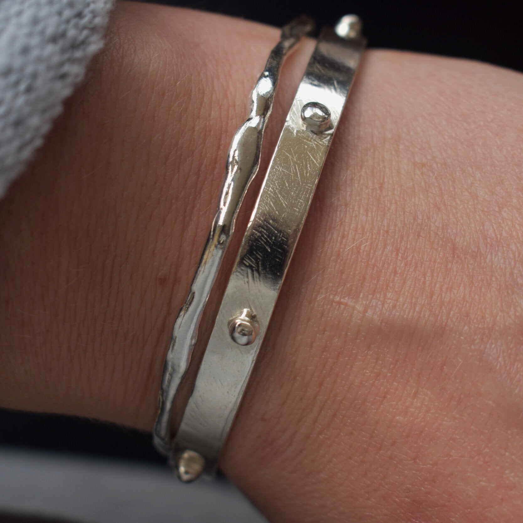 Solid silver round wire bangle nugget bangle organic texture bangle. handmade to order. silver bangle stack. Can be worn alone or with a combination of other bangles from the collection. Round thick silver stack bangle silver cuff charm bracelet round solid silver bangle ladies bracelet with charm personalised word bracelet bangle stack silver. 