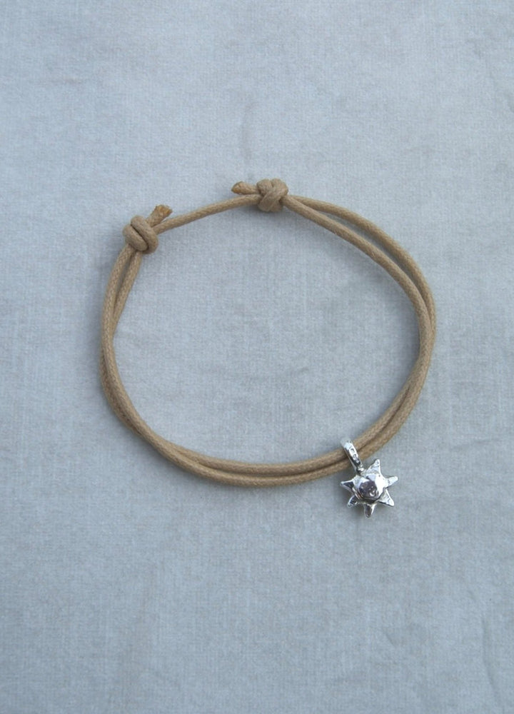 adjustable cotton rope bracelets with mini silver sun charm.All pieces are handmade to order. Please allow 7 days for dispatch.
silver charm bracelet. sailing rope silver charm bracelet gift for him small gift personalised bangle. silver sunshine charm happy bracelet colourful bracelet men's bracelet