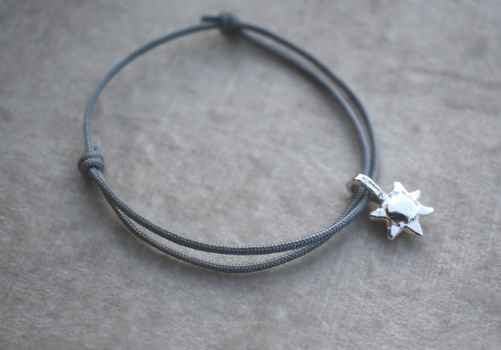 adjustable cotton rope bracelets with mini silver sun charm.All pieces are handmade to order. Please allow 7 days for dispatch.
silver charm bracelet. sailing rope silver charm bracelet gift for him small gift personalised bangle. silver sunshine charm happy bracelet colourful bracelet 