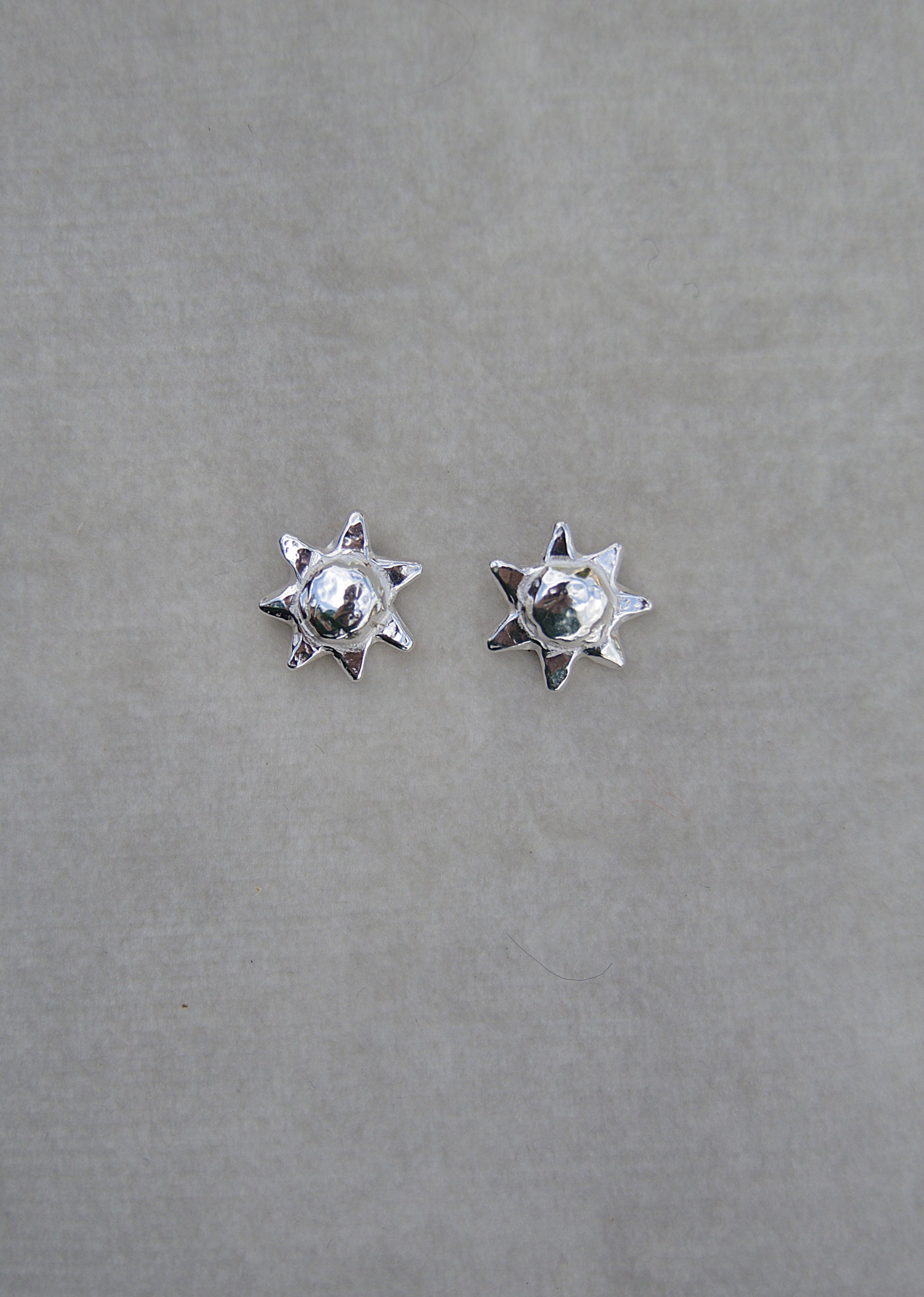 Silver sun shape studs. From the sunshine collection silver stud one size.
Sunshine shape stud charm silver earrings gift for her gift for him silver charm earrings